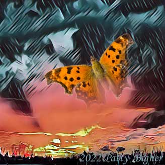 Orange and brown butterfly flying through dark eerie clouds