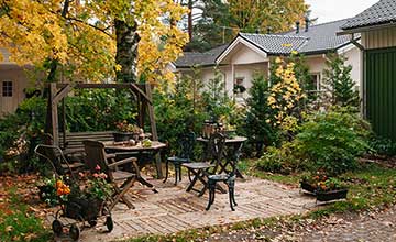 home sale porch feature | Gardens with Wings cozy backyard porch