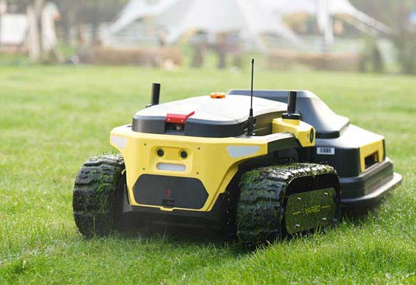 robotic lawnmower | Gardens with Wings yellow robotic lawn mower