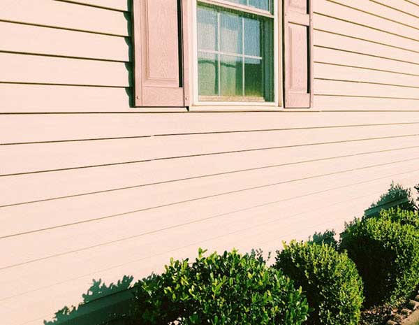 tan siding | Gardens with Wings siding